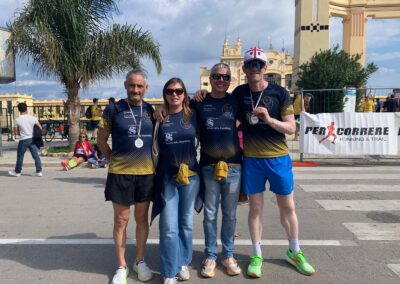 Sport inclusivo: i due atleti AiCS Rocca e Pili D’Ottavio vincono la mezza maratona paralimpica